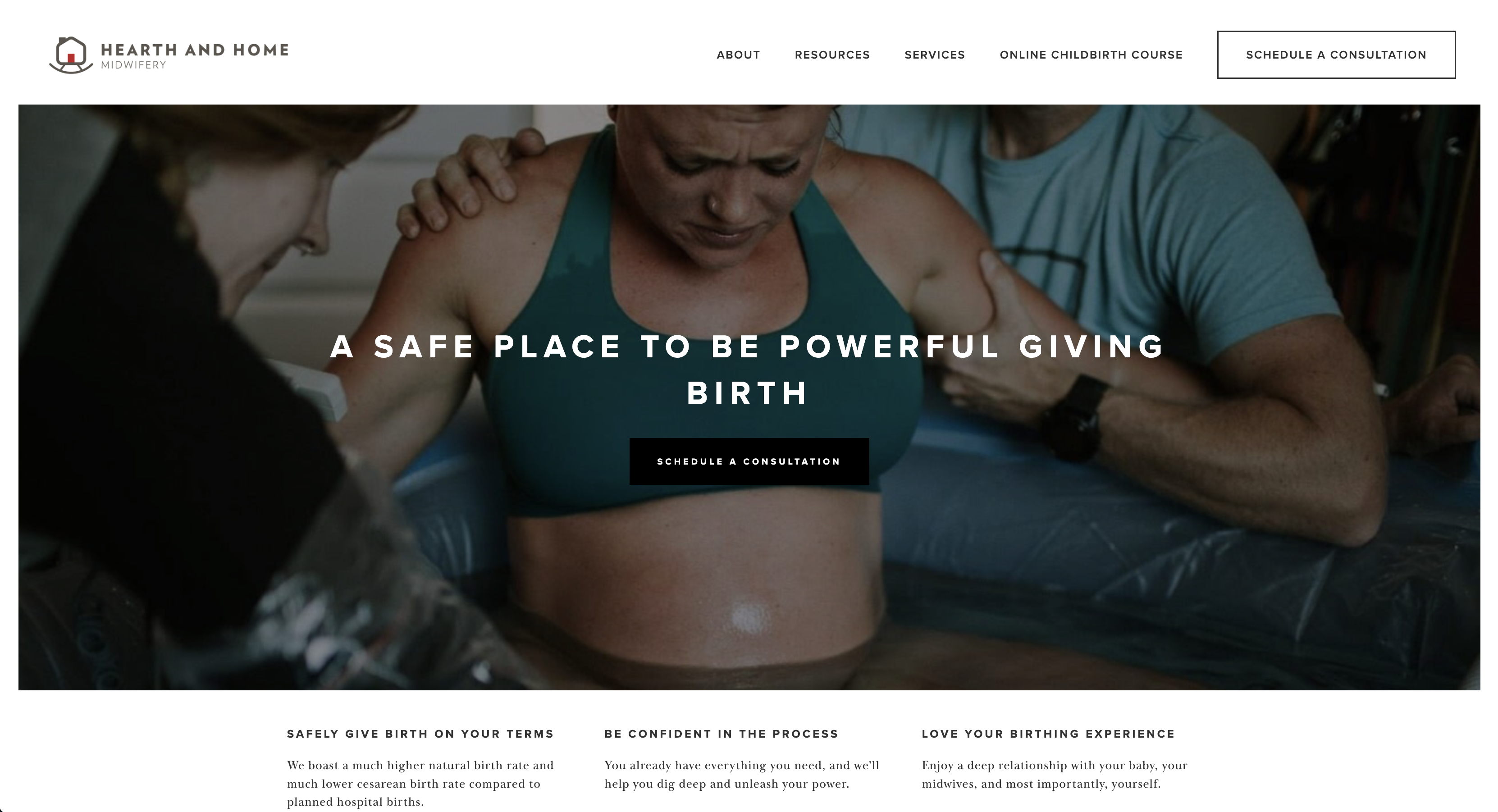 A person in labor sits in a birthing pool, supported by two people on either side. The scene conveys a calm, supportive environment for home birth. Text overlay reads: A safe place to be powerful giving birth.